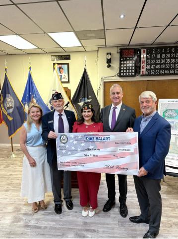 MDB Saunders Yvette Lauren Check Presentation