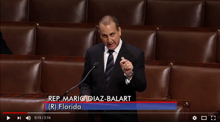 Congressman Diaz-Balart at podium