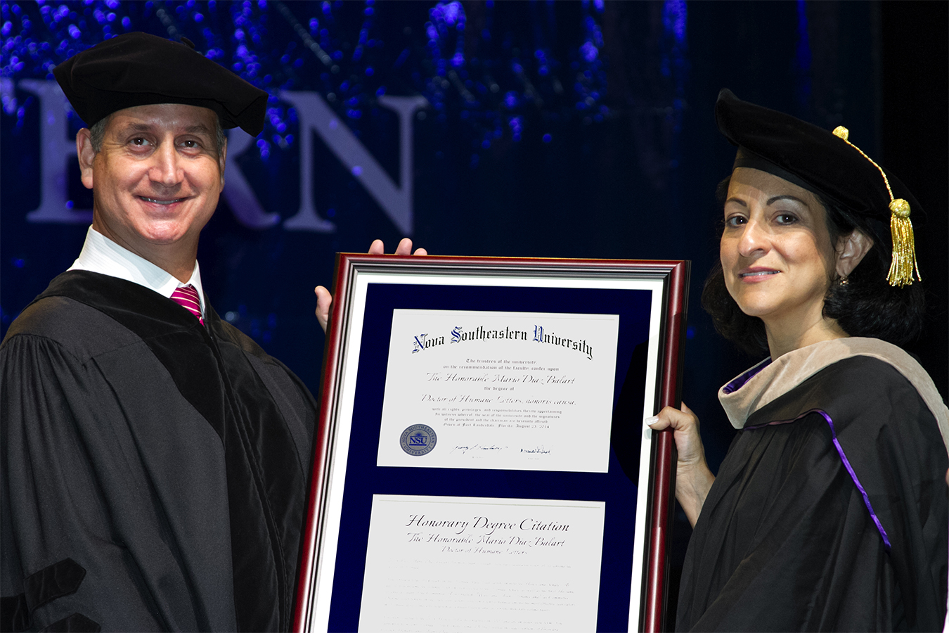 Congressman Diaz-Balart posing with awardee