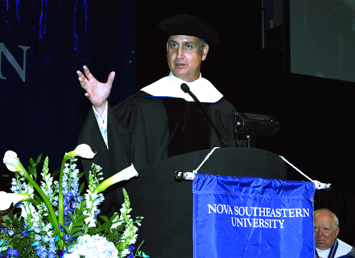 Congressman Diaz-Balart at podium