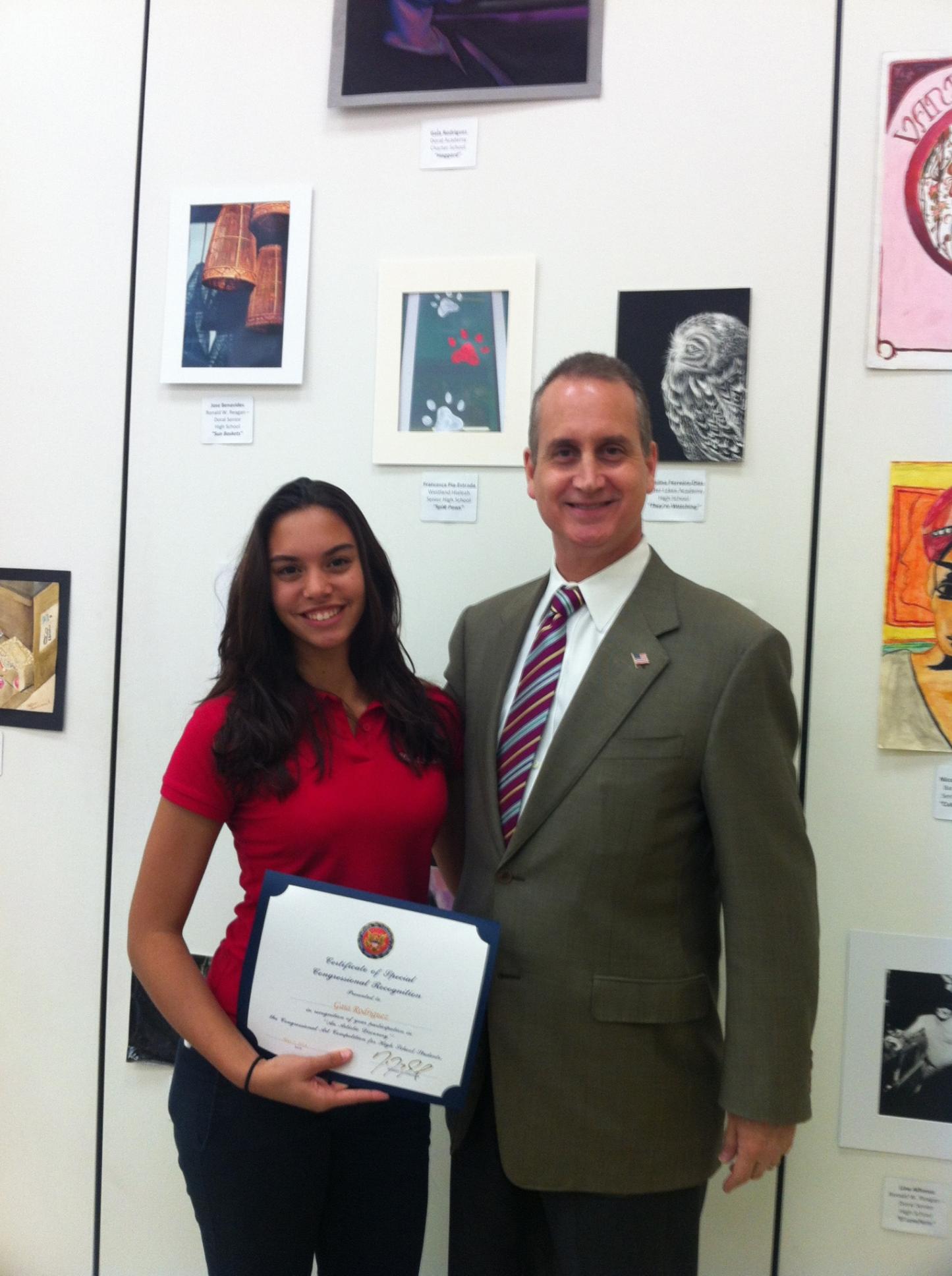 Congressman Diaz-Balart posing with winner