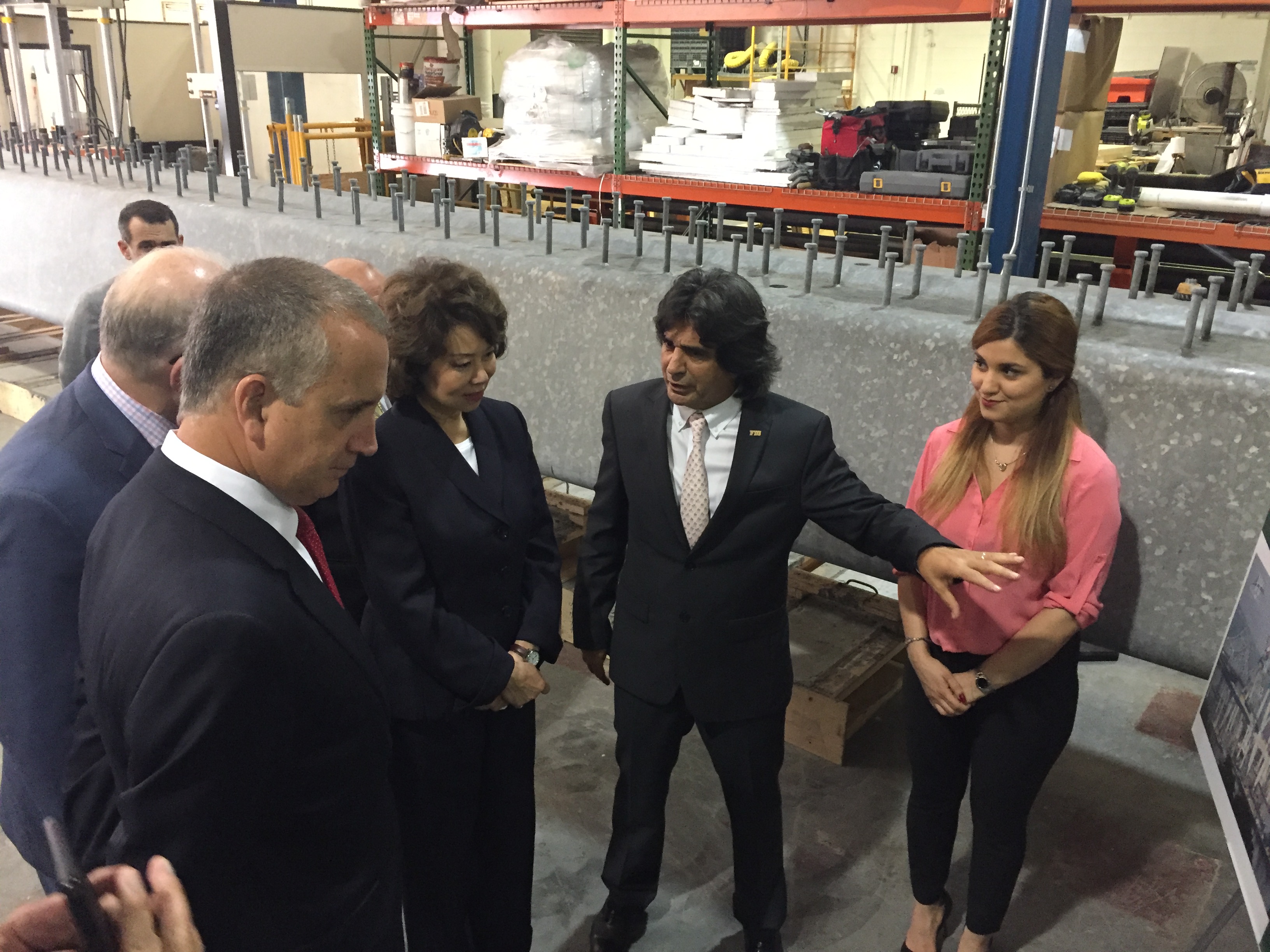 Congressman Diaz-Balart talking with people in the field