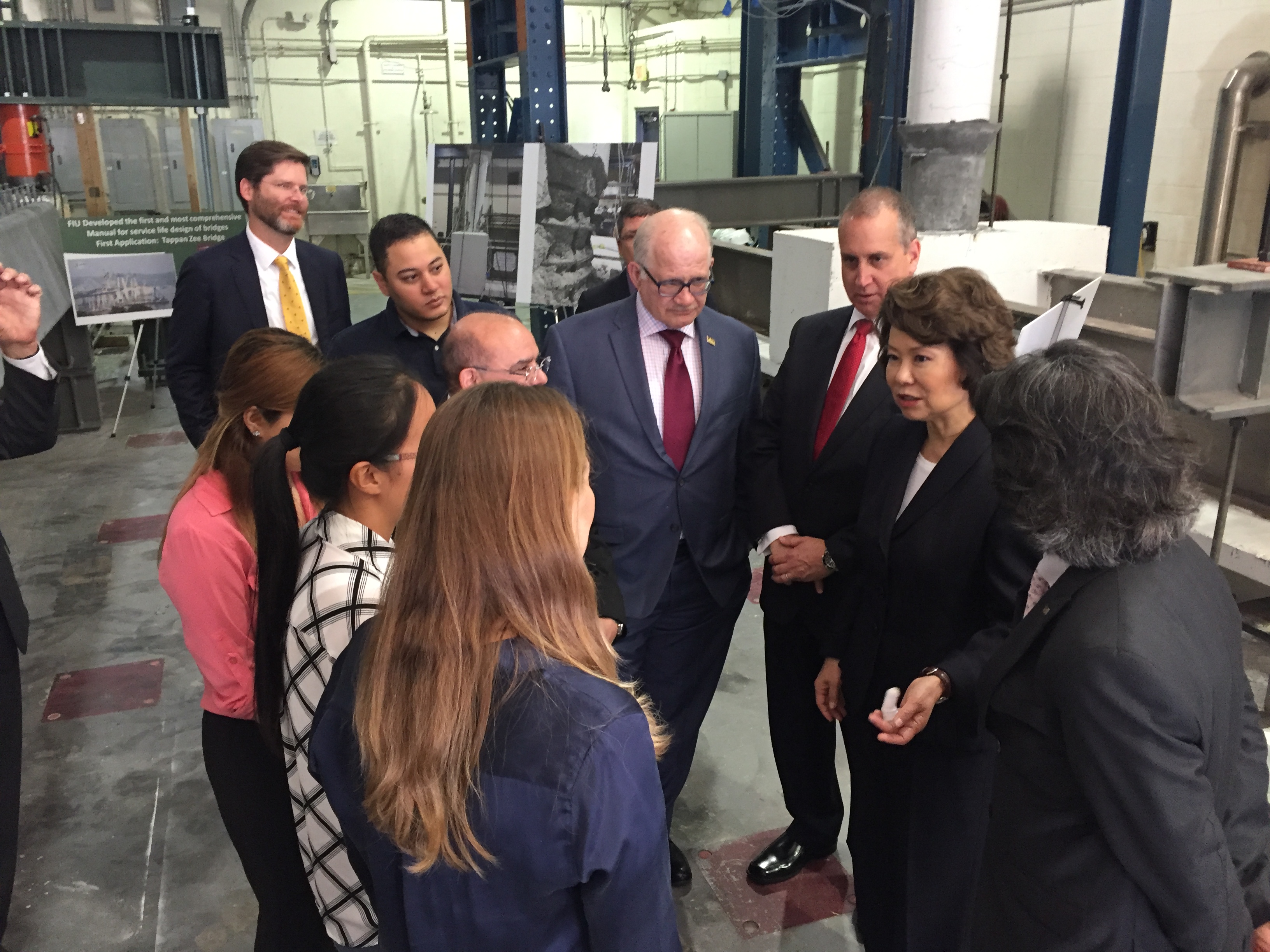 Congressman Diaz-Balart talking to people in the field