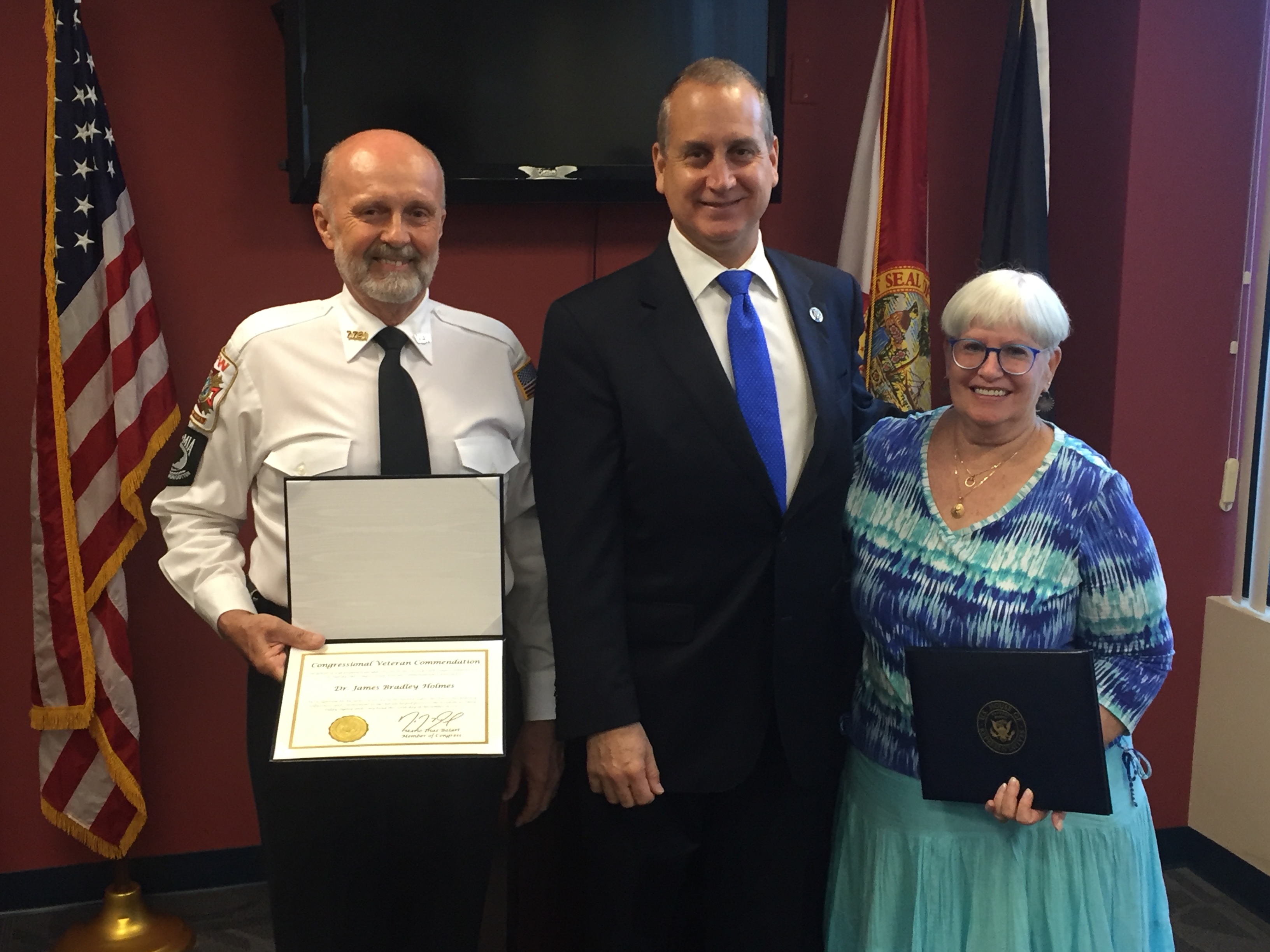 Congressman Diaz-Balart posing with others