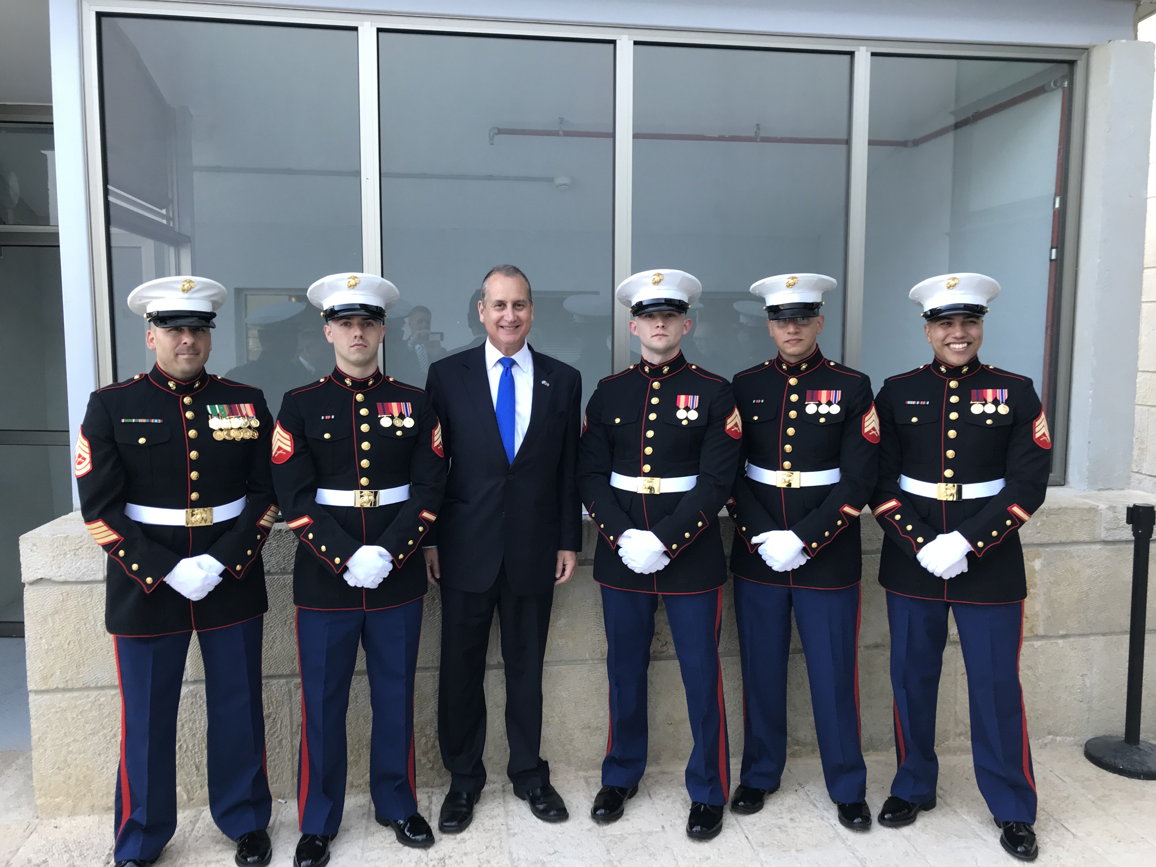 Men in uniform posing