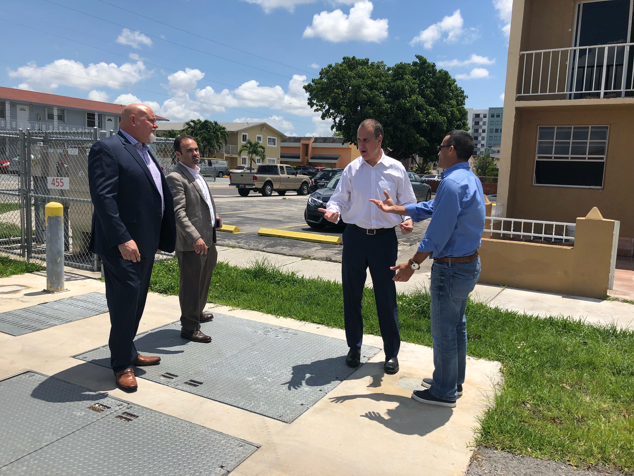 Congressman Diaz-Balart talking to people in the field
