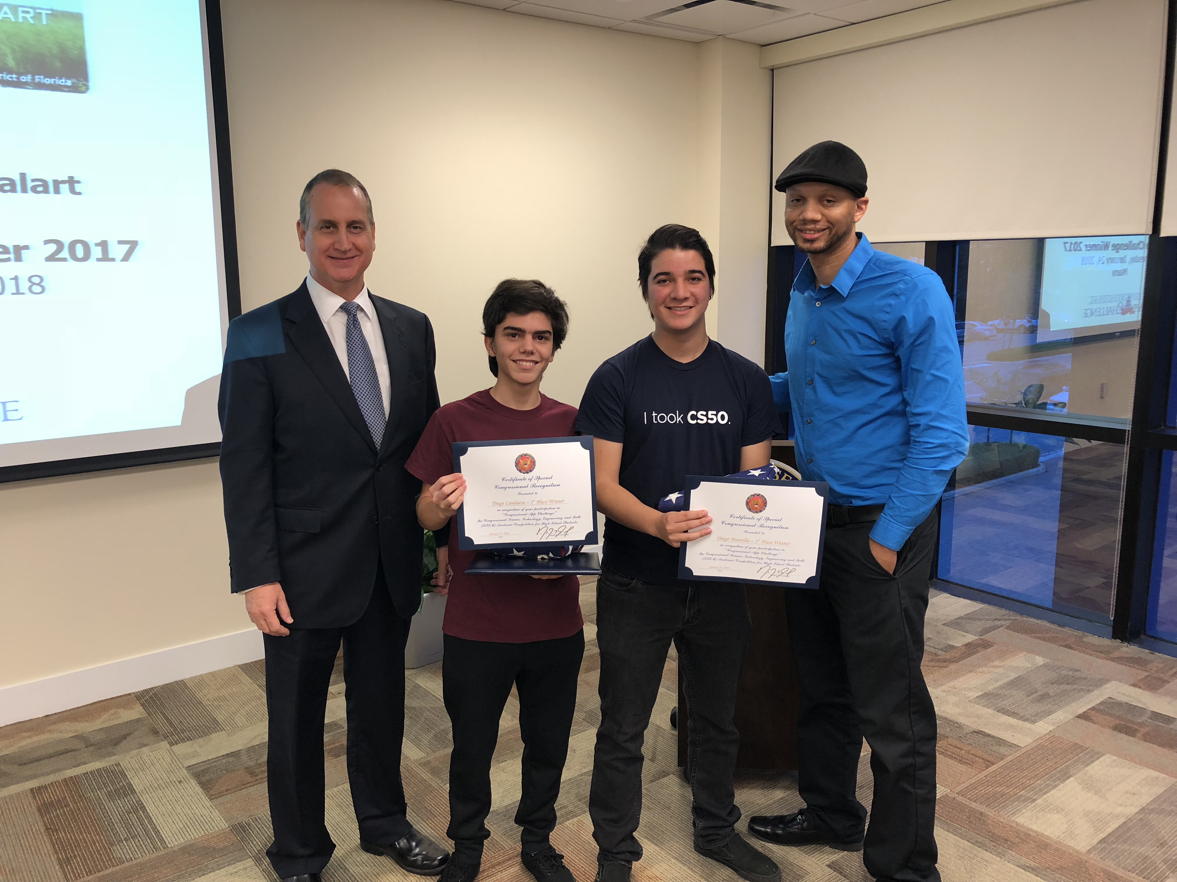 Congressman Diaz-Balart posing with awadees
