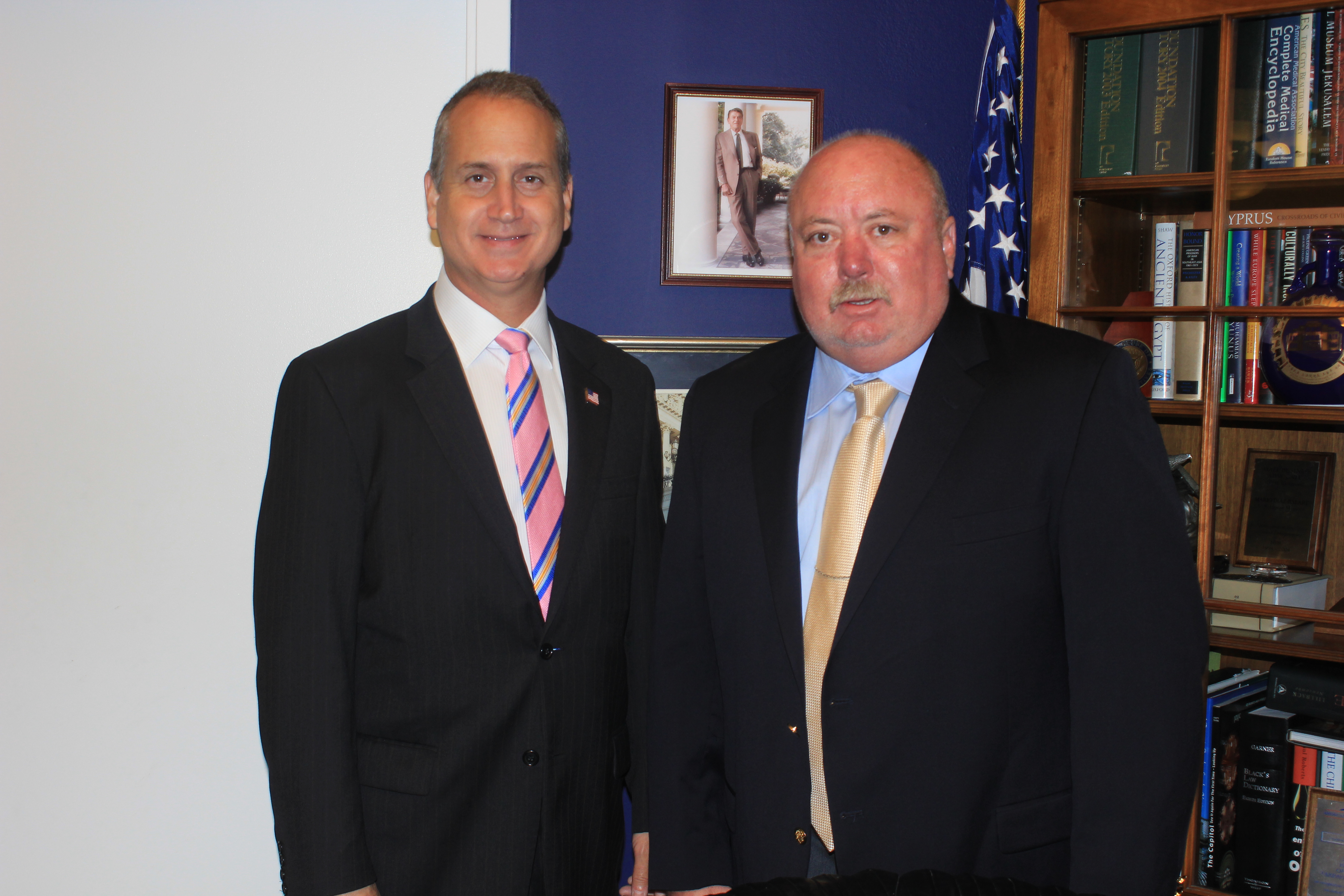 Congressman Diaz-Balart posing with man