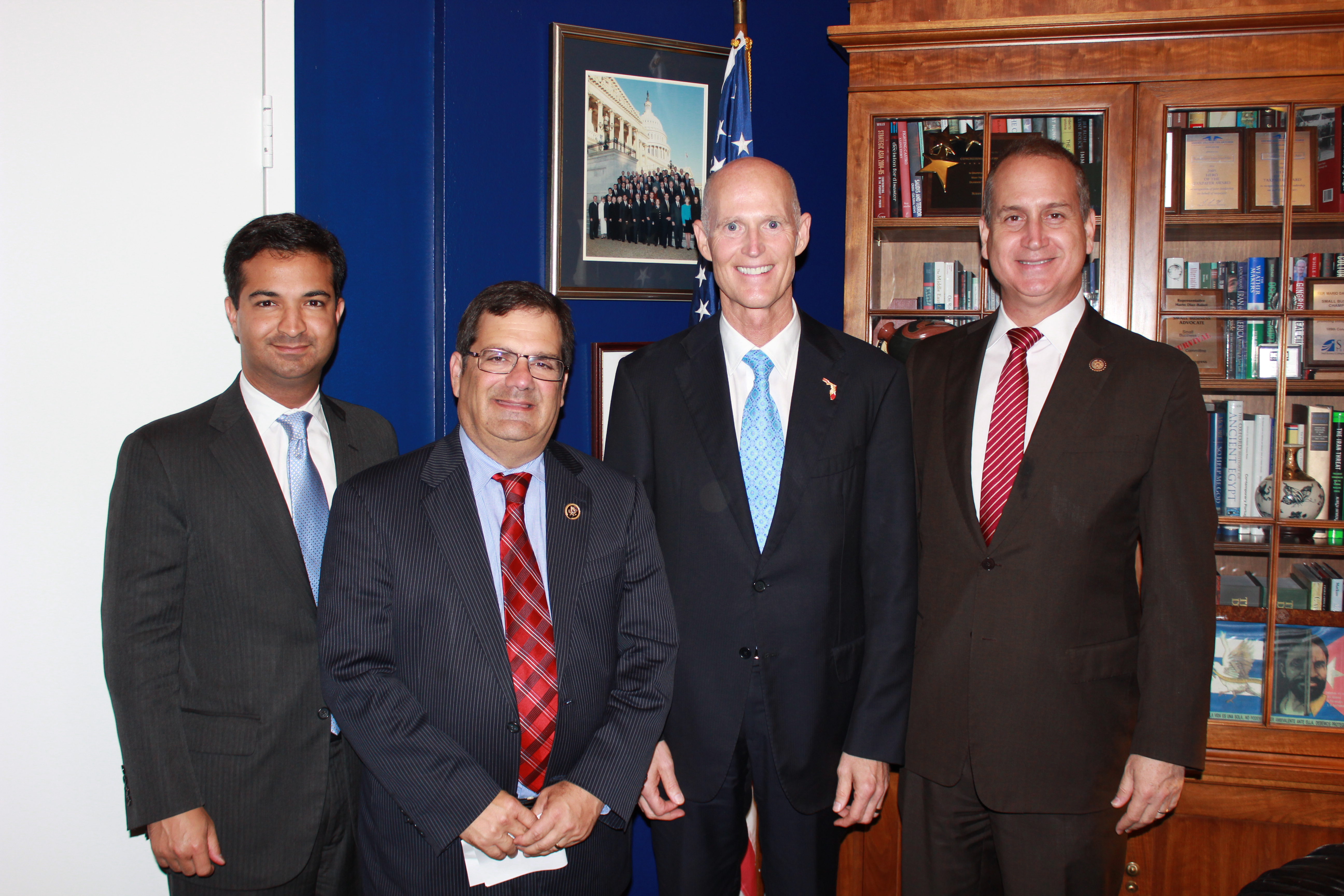 Congressman Diaz-Balart posing with others