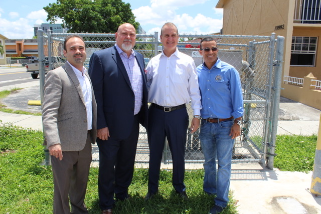 Congressman Diaz-Balart posing with others
